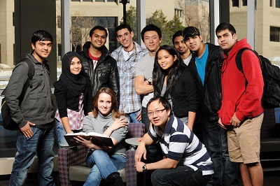 An image of several students smiling at the camara